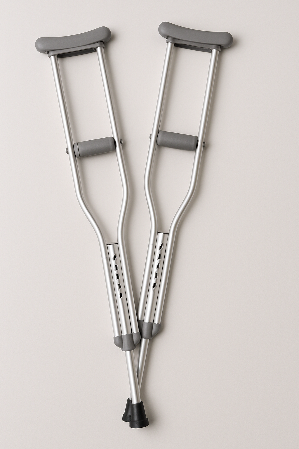 Aluminum crutches (adjustable) — adjustable aluminum crutches for mobility support during recovery.